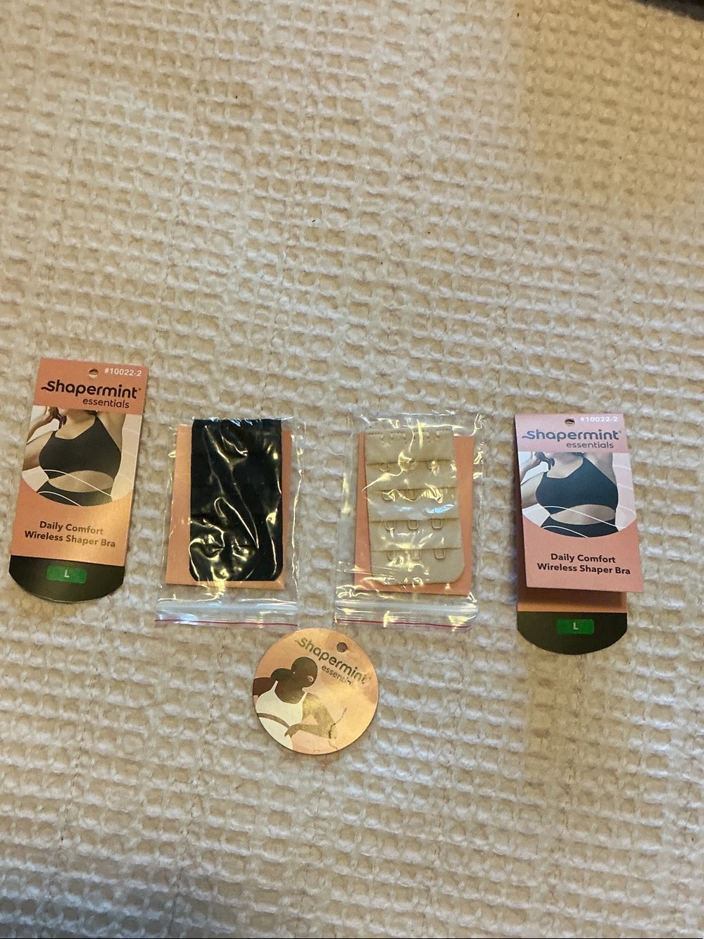 Shapermint set of two bra extenders, for 3 hook bra. One black, one beige.